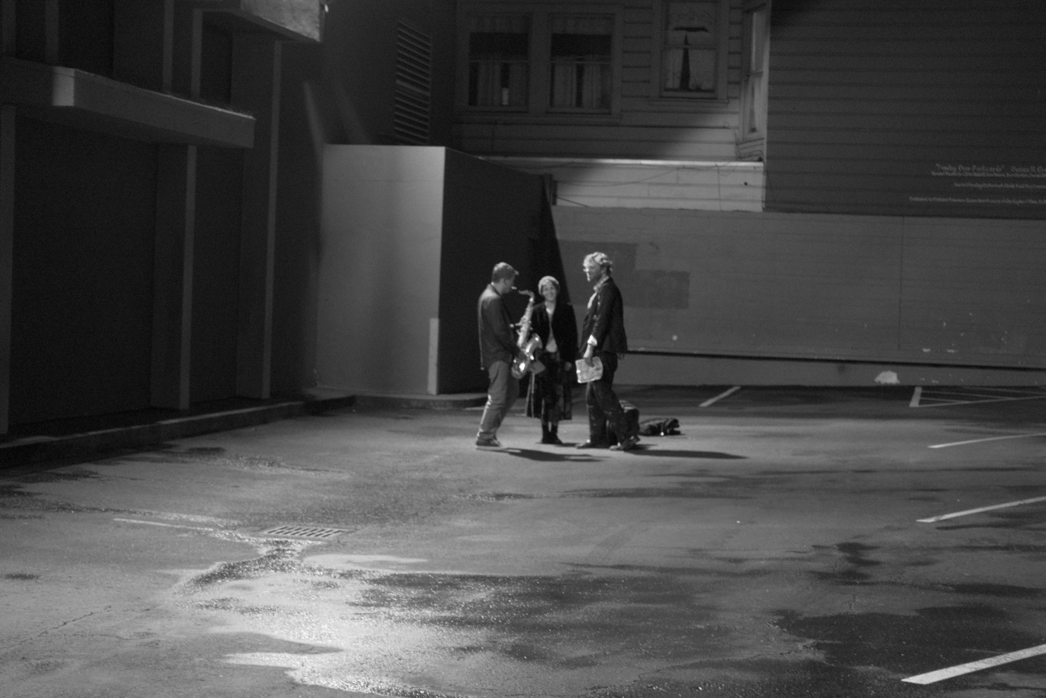 Random saxophone player in a parking lot in the mission